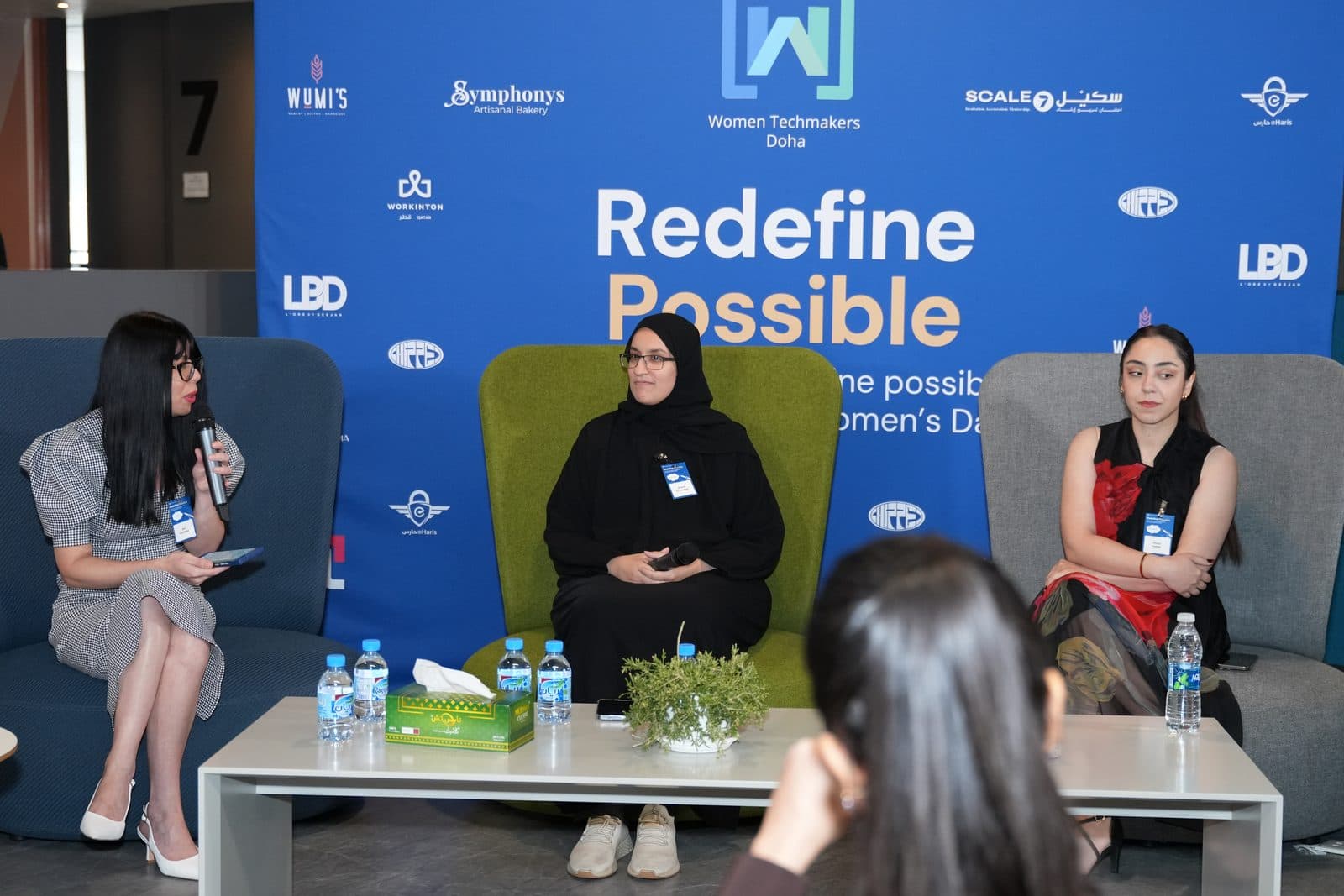 Moderating a panel at the Women in Tech Qatar conference, 2025